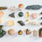 assorted color of stone on white table